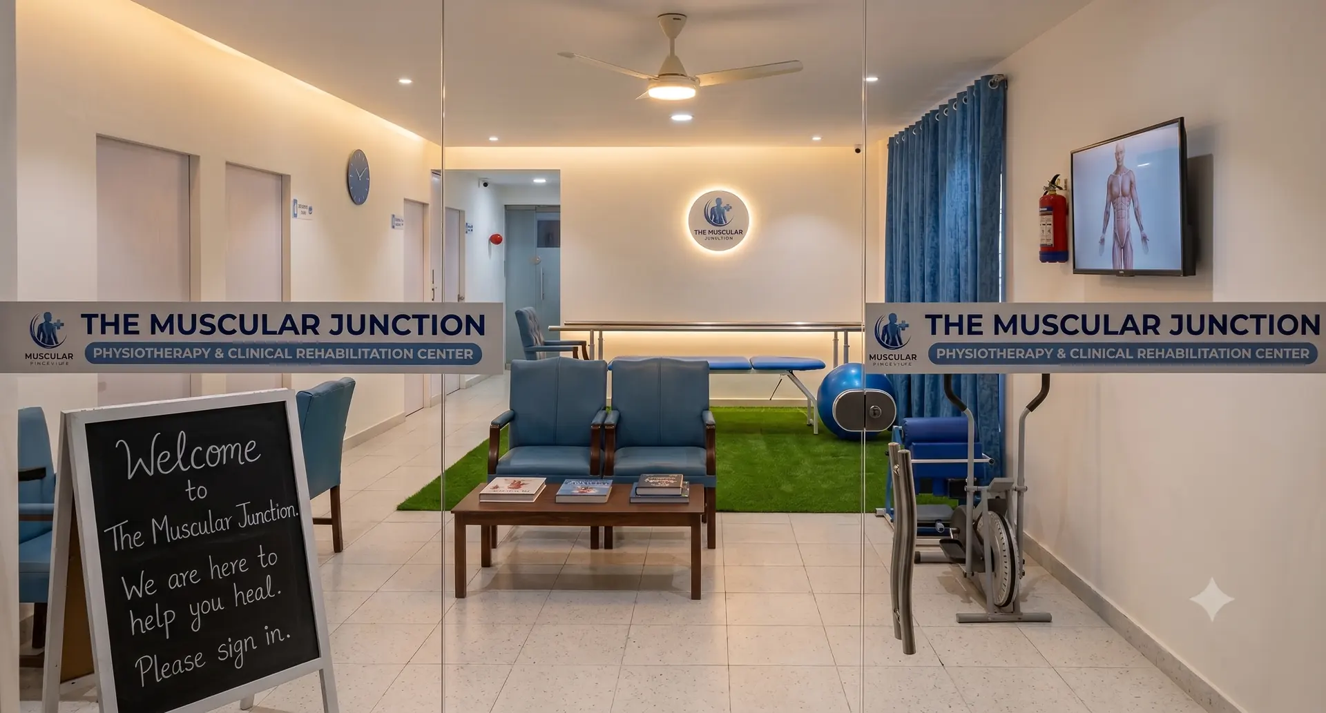 The reception and treatment area at The Muscular Junction physiotherapy clinic in River Gardens, Islamabad